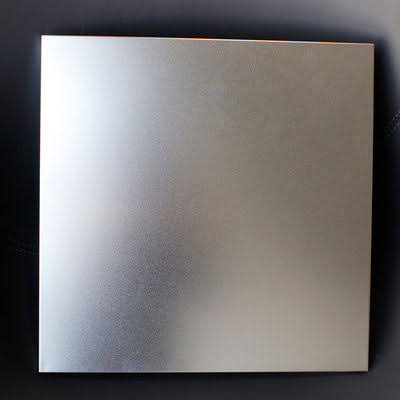 Satin brushed metal polishing texture on stainless steel board